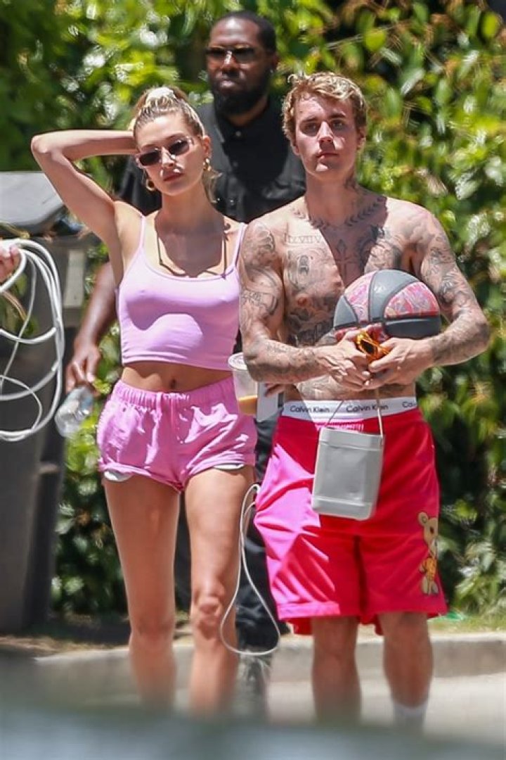 Justin Bieber Shows Off His Glistening Muscles While Stepping Out With Hailey Baldwin — Pics