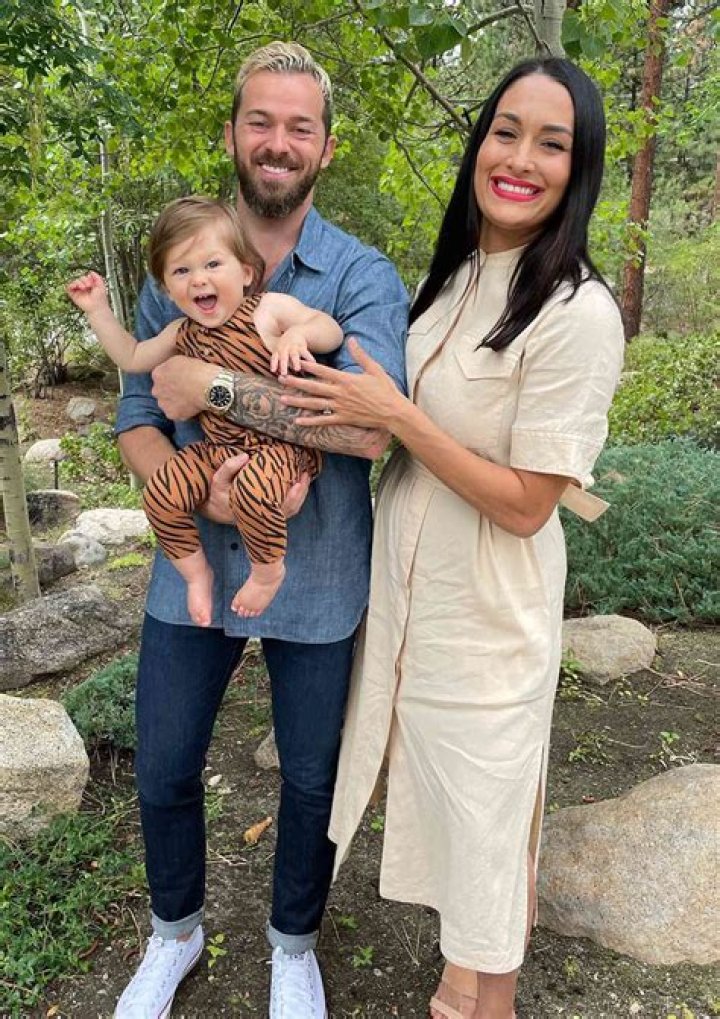 Nikki Bella Shares Sweet New Pic Of Baby Matteo In The Arms Of Artem Chigvintsev: ‘My Boys’