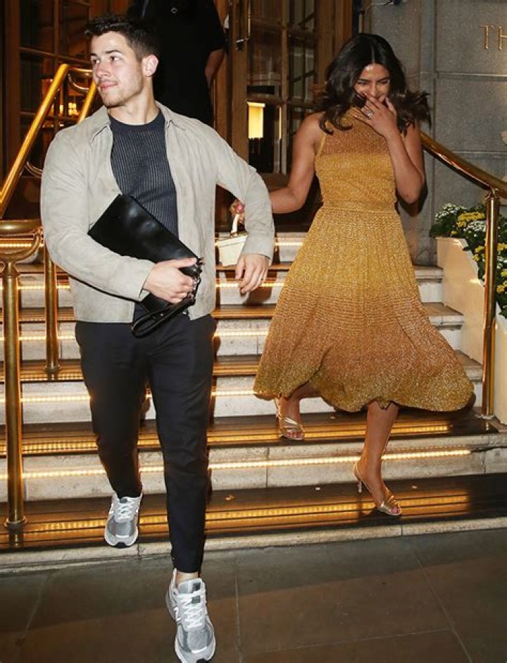 Dazzles In London With Nick Jonas – Hollywood Life